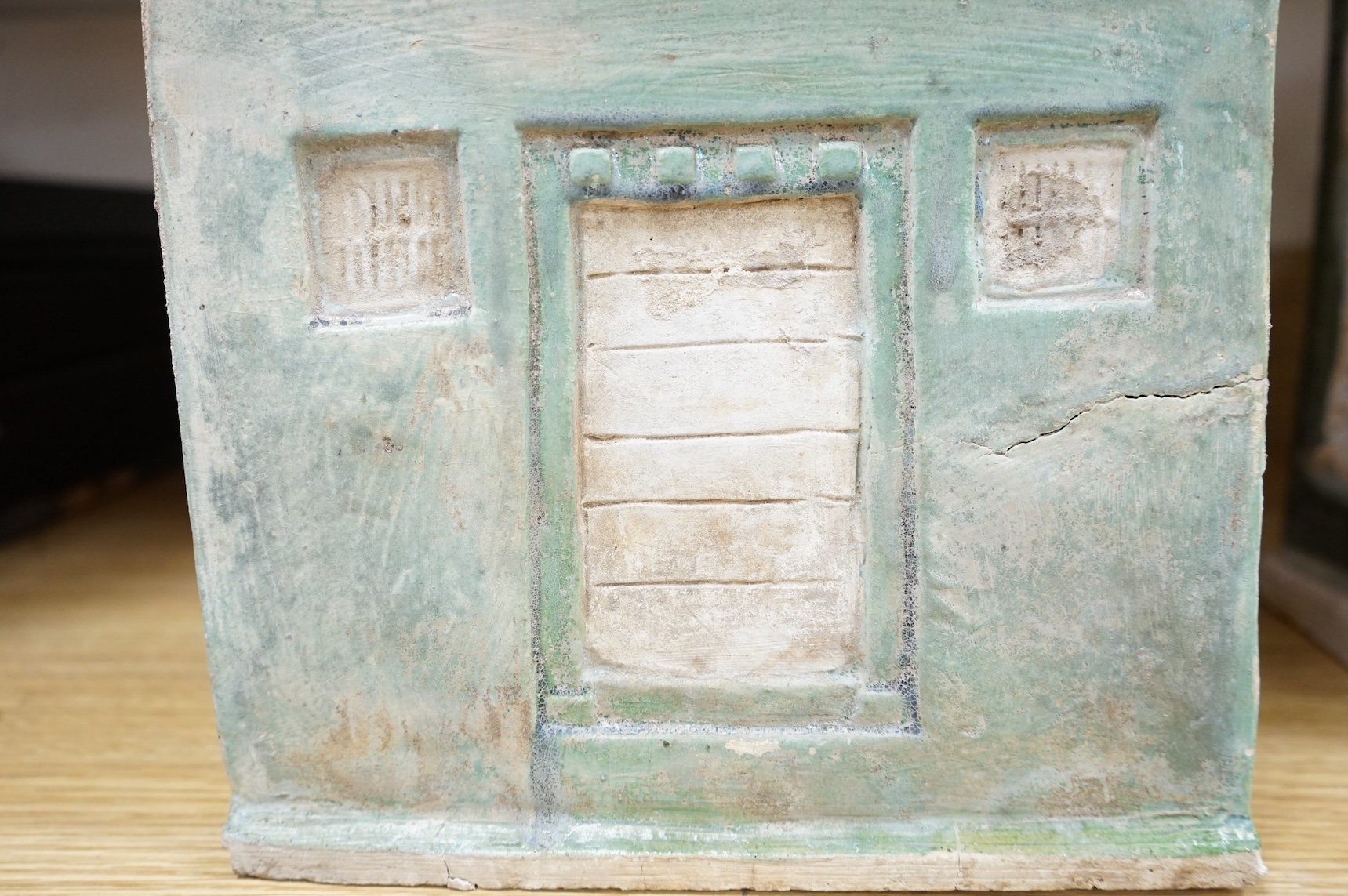 A Chinese Ming sancai glazed model of a cupboard and a shrine, 16th century, 40cm high
